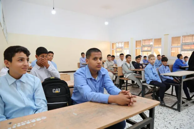 طلاب ليبيون في اليوم الأول من العام الدراسي بإحدى المدارس (وزارة التربية والتعليم)