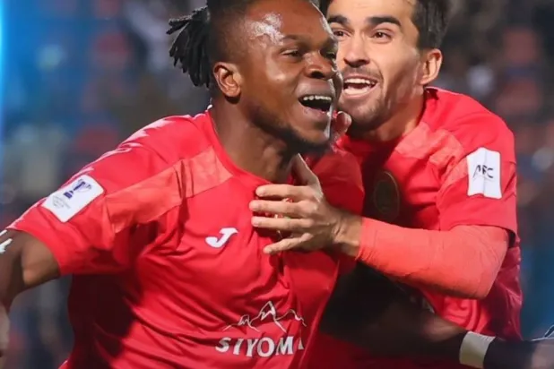 كومولاف محتفلاً بهدف الفوز (موقع الاتحاد الآسيوي) 