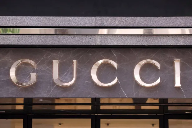 FILE PHOTO: The logo of fashion house Gucci is seen outside a shop in Milan, Italy, April 8, 2024. REUTERS/Claudia Greco/File Photo