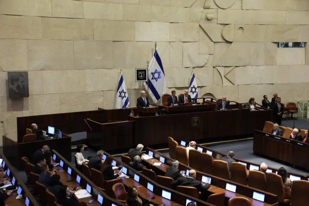 Israeli Prime Minister Benjamin Netanyahu (C) delivers a speech at the opening of the winter session of the Israeli parliament, Knesset, in Jerusalem, 20 October 2025.  EPA/ABIR SULTAN