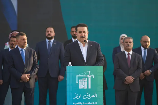 Prime Minister Mohammed Shia al-Sudani speaks at his political block campaign rally before the parliamentary elections in Mosul, Iraq, Oct. 18, 2025. (AP)