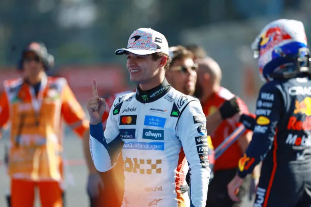 سائق مكلارين البريطاني لاندو نوريس بطل المكسيك (رويترز)