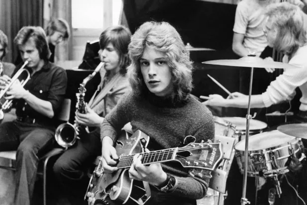 Young Swedish actor and musician Bjorn Andresen, plays guitar with a pop music band, 30 September 1971 in Stockholm, Sweden. (AFP)