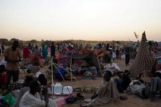  A general view of people sitting at a camp for displaced families who fled from el-Fashir to Tawila, North Darfur, Sudan, October 27, 2025. (Reuters)