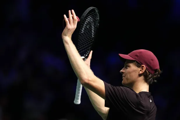 Italy's Jannik Sinner celebrates after winning against Belgium's Zizou Bergs following their men's singles match on day three of the Paris ATP Masters 1000 tennis tournament in Nanterre, on the outskirts of Paris, on October 29, 2025. (Photo by Dimitar DILKOFF / AFP)