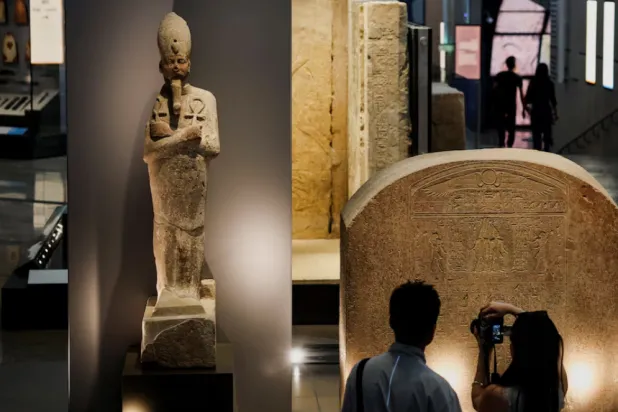 Tourists look at exhibits at the Grand Egyptian Museum (GEM), which is scheduled to officially open on November 1, 2025, following a partial opening last year, in Giza, Egypt, June 2, 2025. Reuters