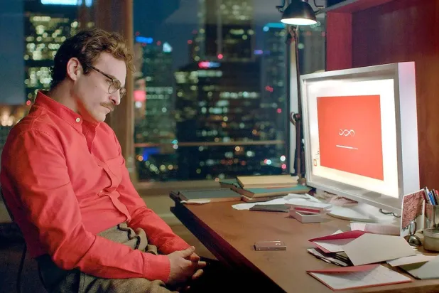 Yeni bir araştırmaya göre, Amerikalıların neredeyse üçte biri, bir yapay zeka sohbet botuyla "samimi veya romantik bir ilişki" yaşadığını söylüyor. Bu tür ilişkiler, Joaquin Phoenix'in başrolünde oynadığı Aşk gibi filmlerle medyada ve popüler kültürde giderek daha fazla yer buluyor (Warner Bros.)