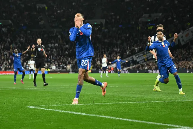 Chelsea's Brazilian striker #20 Joao Pedro reacts after his shot was save by Tottenham Hotspur's Italian goalkeeper #01 Guglielmo Vicario during the English Premier League football match between Tottenham Hotspur and Chelsea at the Tottenham Hotspur Stadium in London, on November 1, 2025. (Photo by JUSTIN TALLIS / AFP) 