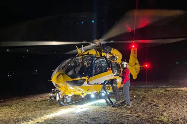 This photo released by the Italian Alpine and Speleological Rescue Corps on Sunday, Nov. 2, 2025, rescuers prepare for rescue operations with a helicopter in search of five mountaineers, all German, who were hit by an avalanche Saturday afternoon, Nov. 1, 2025, while climbing the Cima Vertana, in the Ortler mountains in Solda, Italy. (Corpo Nazionale Soccorso Alpino e Speleologico via AP)
