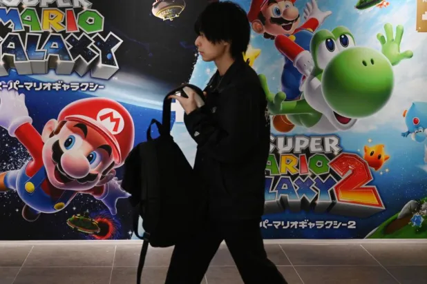 While Nintendo is diversifying into hit movies and theme parks, consoles remain at the core of its business. GREG BAKER / AFP
