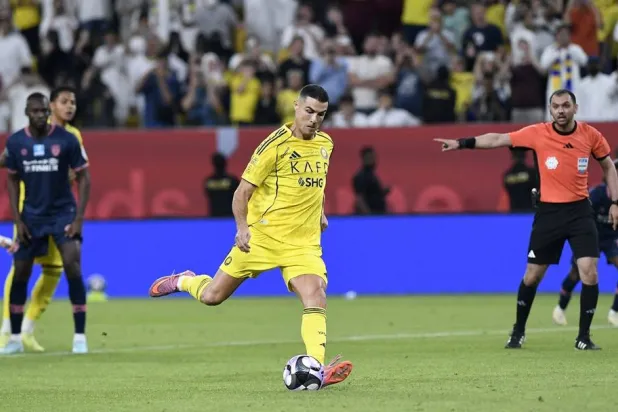 Football - Saudi Pro League - Al-Nassr v Al-Fayah - Al-Awwal Park, Riyadh, Saudi Arabia - November 1, 2025 Al-Nassr's Cristiano Ronaldo scores their second goal from the penalty spot. (Reuters)