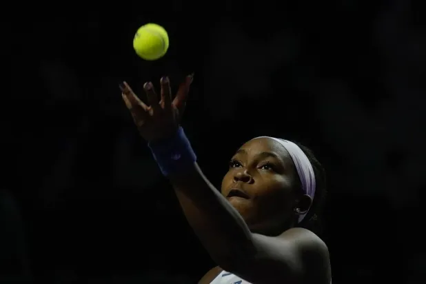  Coco Gauff of the United States plays a shot against Jasmine Paolini of Italy during their women's singles match at the WTA tennis finals in Riyadh, Saudi Arabia, Tuesday, Nov. 4, 2025. (AP) 