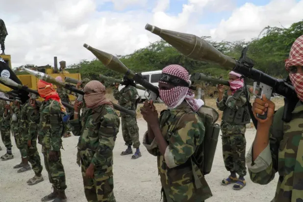 Al-Shabaab fighters display weapons as they conduct military exercises in northern Mogadishu, Somalia, October 21, 2010. (AP file photo)