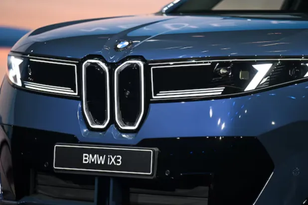 The new BMW iX3 is displayed during its world premiere ahead of the IAA auto show, in Munich, Germany, September 5, 2025. REUTERS/Angelika Warmuth 