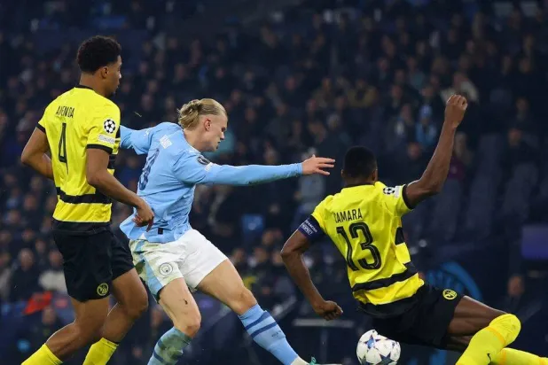 مانشستر سيتي وبوروسيا دورتموند (رويترز).