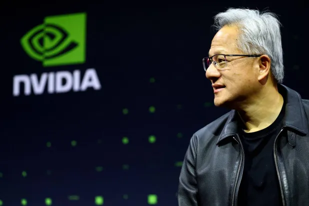 NVIDIA CEO Jensen Huang introduces an "Industrial AI Cloud" project during a press conference in Berlin, Germany, November 4, 2025. REUTERS/Lisi Niesner  