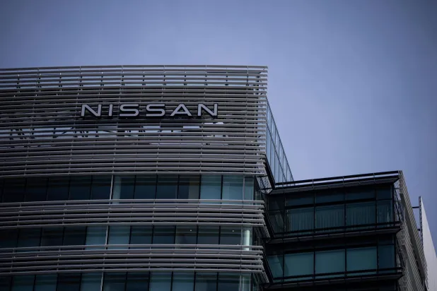 FILE - Nissan signage at Nissan headquarters in Yokohama, near Tokyo, on May 13, 2025. (AP Photo/Louise Delmotte, File)