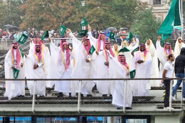 Saudi athletes raising their country’s flag at Paris Olympics - File Photo/SPA