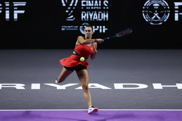 Tennis - WTA Finals - Riyadh - King Saud University Indoor Arena, Riyadh, Saudi Arabia - November 6, 2025 Belarus' Aryna Sabalenka in action during her group stage match against Coco Gauff of the US. REUTERS/Hamad I Mohammed