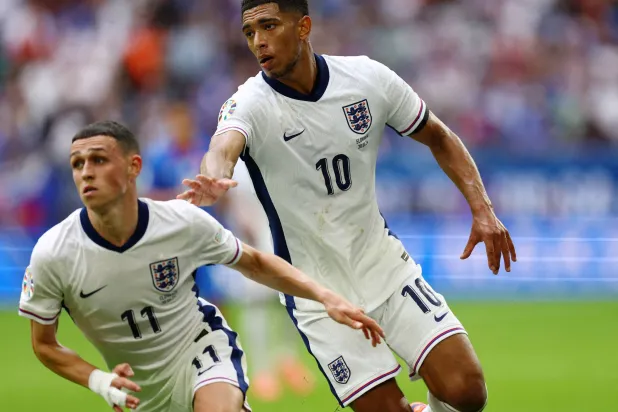 Football - Euro 2024 - Round of 16 - England v Slovakia - Arena AufSchalke, Gelsenkirchen, Germany - June 30, 2024 England's Phil Foden and Jude Bellingham in action. (Reuters)