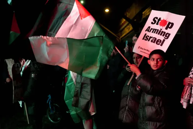 Pro Palestinian campaigners protest outside Villa Park, ahead of the Europa League soccer match between Aston Villa and Maccabi Tel Aviv in Birmingham, England, Thursday, Nov. 6, 2025. (Joe Giddens/PA via AP)
