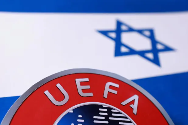 Israeli flag and UEFA logo are seen in this illustration taken September 30, 2025. REUTERS/Dado Ruvic/Illustration