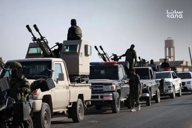 عناصر وزارة الداخلية السورية خلال تنفيذ الحملة الأمنية (سانا)