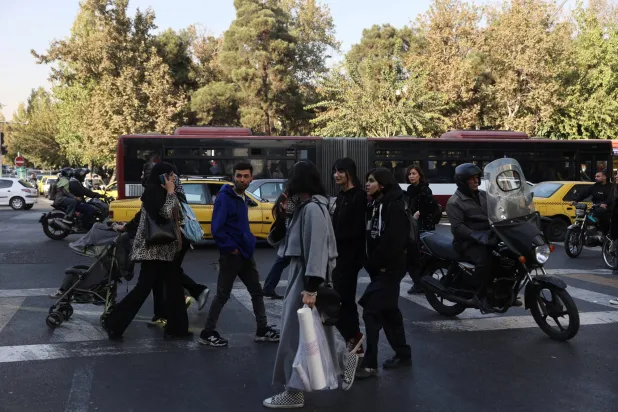 People walk on a street in Tehran, Iran, November 5, 2025. Majid Asgaripour/WANA (West Asia News Agency) via Reuters