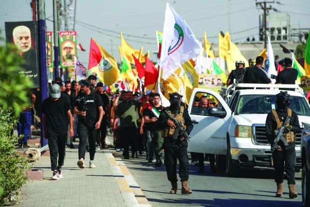 اعضای «کتائب حزب‌الله» در جرف الصخر (AFP)