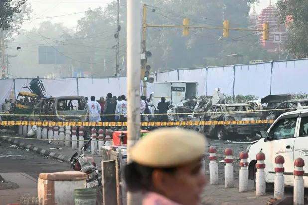  Forensic experts investigate at the blast site following an explosion near the Red Fort in the old quarters of Delhi on November 11, 2025. (AFP)