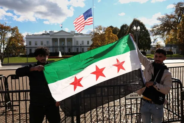  A Syrian flag is displayed outside the White House following the meeting of US President Donald Trump and Syrian President Ahmed al-Sharaa in the Oval Office of the White House in Washington, DC, US, November 10, 2025. (Reuters)