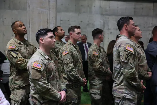 US soldiers listen to Vice President JD Vance as he delivers remarks at the Civilian Military Coordination Center in southern Israel on Friday. (EPA) 