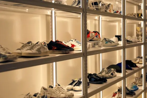 Sneakers of Italian high fashion sneaker brand Golden Goose are displayed at its store in Beijing, China September 23, 2020. Picture taken September 23, 2020. REUTERS/Tingshu Wang 