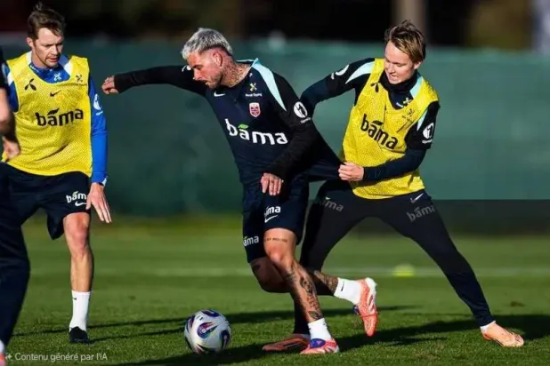 آرون دونن وأندرياس شيلدروب من المنتخب النرويجي لكرة القدم خلال حصة تدريبية (رويترز)