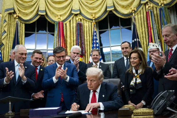 US President Donald Trump (C) signs the funding package to re-open the federal government in the Oval Office of the White House in Washington, DC, USA, 12 November 2025. EPA/BONNIE CASH / POOL
