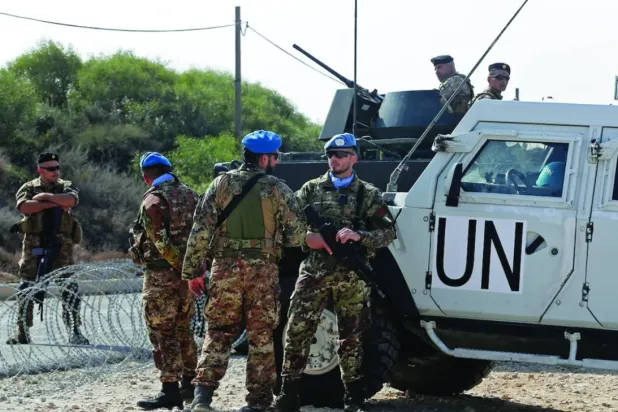 A joint force from UNIFIL and the Lebanese army in Naqoura near the Israeli border (File- AFP)

