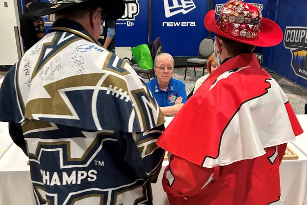 Canadian Football League supporters wear colorful outfits during the Grey Cup Championship week in Winnipeg, Manitoba, Canada, November 13, 2025. REUTERS/Ed White
