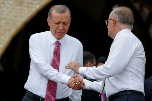 President Tayyip Erdogan shakes hands with Australia's Prime Minister Anthony Albanese before a MIKTA photo session amidst the G20 leaders' summit in Nusa Dua, Bali, Indonesia, November 15, 2022. REUTERS/Ajeng Dinar Ulfiana/Pool/File Photo 