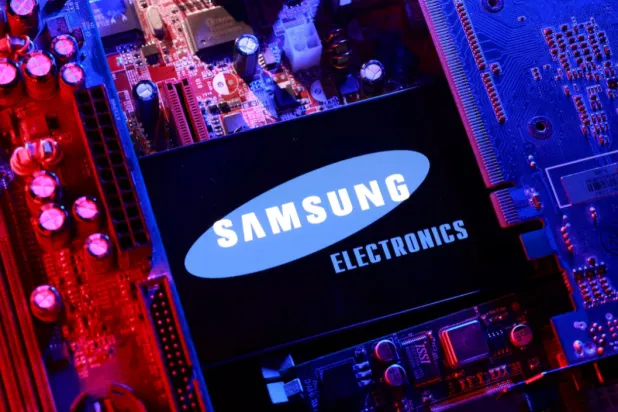 A Samsung Electronics logo and a computer motherboard appear in this illustration taken August 25, 2025. REUTERS/Dado Ruvic/Illustration/File Photo 