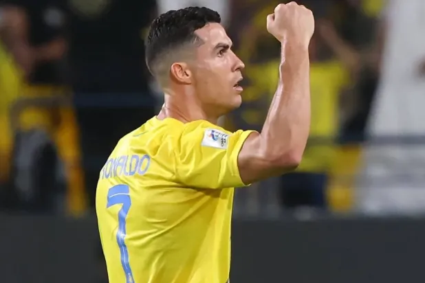 Al-Nassr's Portuguese forward #07 Cristiano Ronaldo celebrates after scoring his team's first goal during the AFC Champions League group E football match between Saudi Al-Nassr SC and Tajikistan's FC Istiklol at King Saud University Stadium in Riyadh on October 2, 2023. (AFP)
