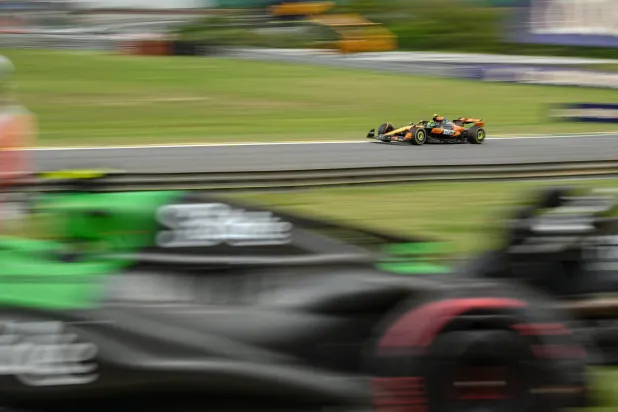 09 November 2025, Brazil, Sao Paulo: British Formula One driver Lando Norris of team McLaren, drives during the Formula One Brazilian Grand Prix at the Interlagos Circuit. (dpa)