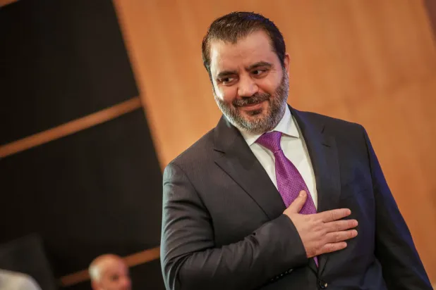 Syria's Foreign Minister Asaad al-Shibani attends the opening session of a series of meetings between representatives of Syria's civil society, in the presence of European Union and transitional government officials, at a conference center on the southern outskirts of Damascus, Saturday, Nov. 15, 2025. (AP Photo/Ghaith Alsayed)