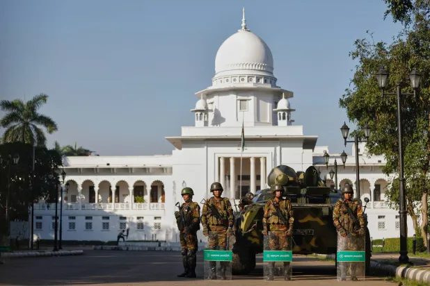 Bangladeshi Army soldiers stand guard outside the Supreme Court after security have been beefed up across the country ahead of an expected verdict against ousted Prime Minister Sheikh Hasina, in Dhaka, Bangladesh, Monday, Nov. 17, 2025. (AP)