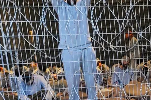 This undated photo from winter 2023 provided by Breaking The Silence, a whistleblower group of former Israeli soldiers, shows blindfolded Palestinian prisoners captured in the Gaza Strip by Israeli forces at a detention facility on the Sde Teiman military base in southern Israel. (Breaking The Silence via AP, File)

