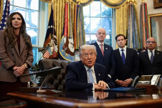 US President Donald Trump speaks while US Homeland Security Secretary Kristi Noem, FIFA President Gianni Infantino, US Secretary of State Marco Rubio, and Senior advisor to FIFA president Carlos Cordeiro stand near him, as he meets with the White House Task Force on the FIFA World Cup 2026 in the Oval Office at the White House in Washington, DC, US, November 17, 2025. (Reuters) 