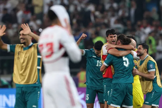  Soccer Football - FIFA World Cup - AFC Qualifiers - Play Off - Second Leg - Iraq v United Arab Emirates - Basra International Stadium, Basra, Iraq - November 18, 2025 Iraq's Manaf Younis celebrates with teammates after the match. (Reuters)