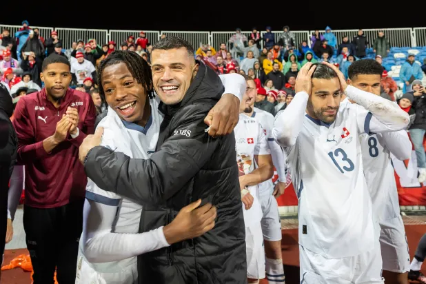 احتفالية لاعبي سويسرا بالتأهل لكأس العالم (أ.ب)