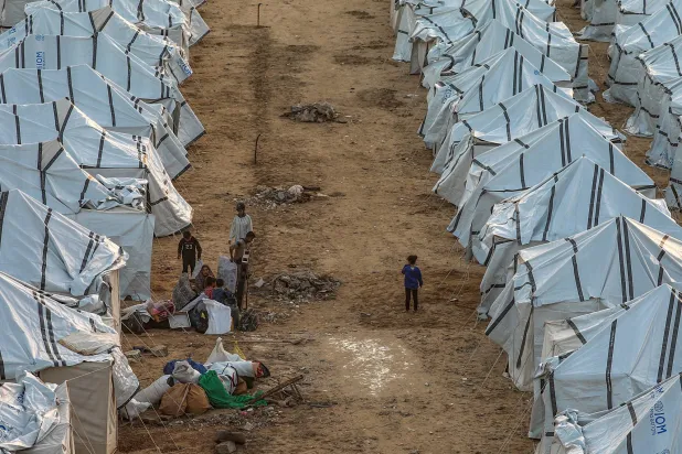 Displaced people among tents in Gaza City on Tuesday (EPA)