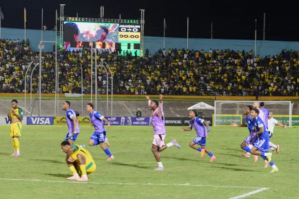Curaçao players celebrate qualifying for the 2026 FIFA World Cup after a soccer match against Jamaica in Kingston, Jamaica, Tuesday, Nov. 18, 2025. (AP)