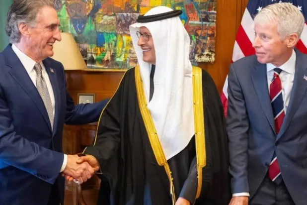 Prince Abdulaziz bin Salman shakes hands with the US Secretary of the Interior. Photo: X